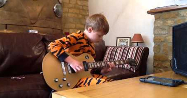 Pajamas bear teddy matching print fleece choose board 10 Year Old In Tiger Pajamas Grabs This Guitar. When He Touches The