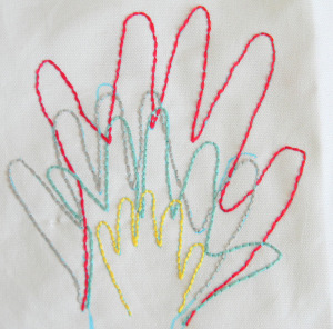 Embroidered hand prints