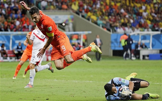 Robin Van Persie is denied a goal Robin Van Persie is denied a goal