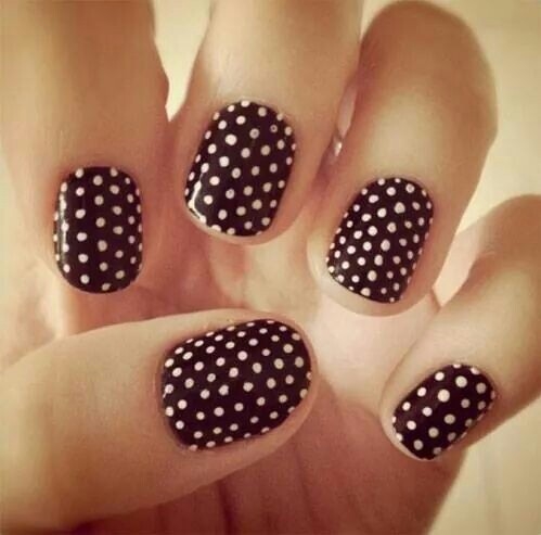 Black polka dot nails