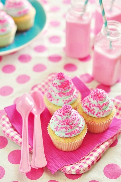 Pink sprinkles on cupcakes