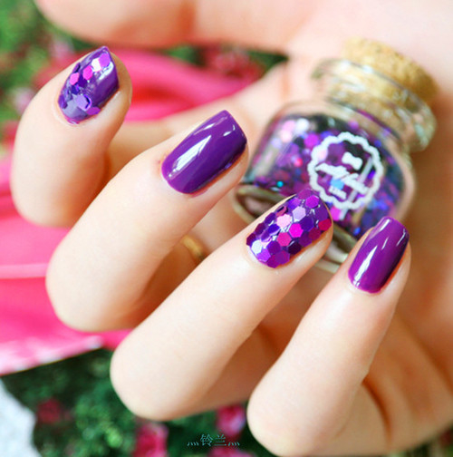 Violet glossy nails