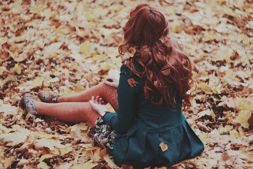 Girl playing in the leaves Girl playing in the leaves
