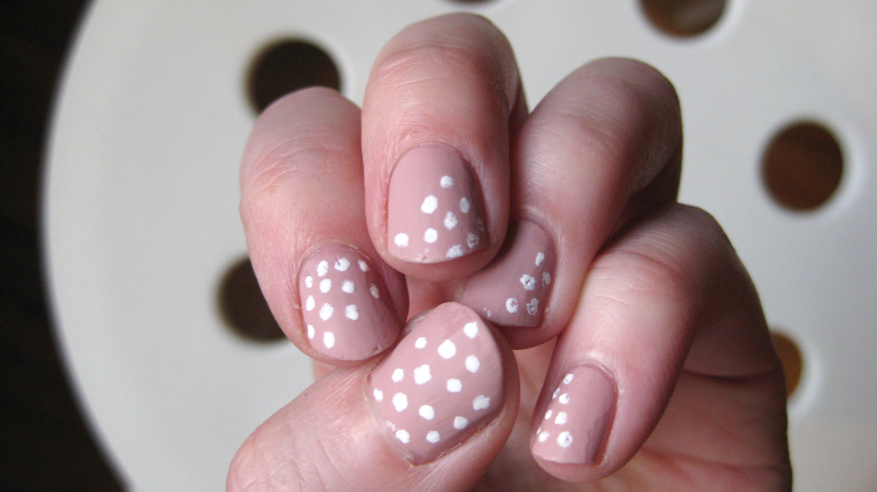 Nude nails with white polkadot nails