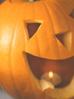 Candle in pumpkin