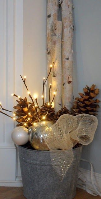 Bucket filled with Pinecones, Gold & White Tree Balls, Gold Mesh Ribbon and White Lights