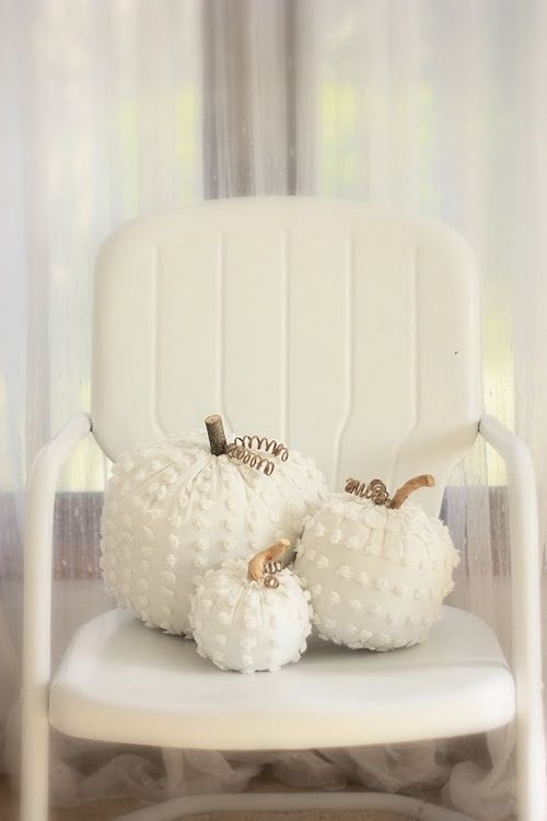 Material with Poms Wrapped Around Pumpkins