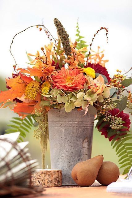 Bucket filled with Leaves and Fall Flowers Bucket filled with Leaves and Fall Flowers