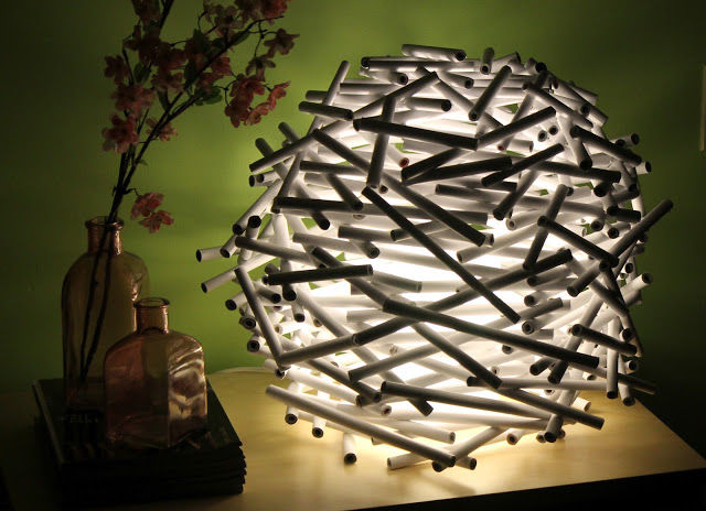 Rolled up newspaper lamp