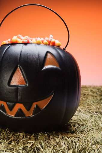 Pumpkin basket full of candy corn
