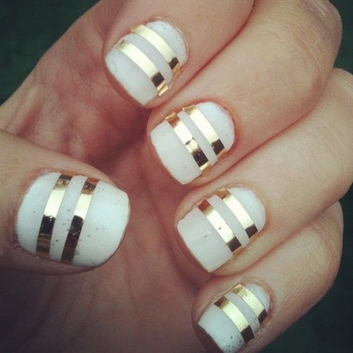 Gold striped white nails Gold striped white nails
