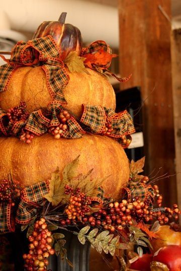 Stacked Pumpkins Decorated with Ribbons, Leaves & Berries