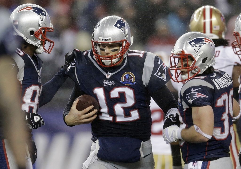 Tom the Great passes for 30 of 35 with 5 TDs SETTING THE RECORD
