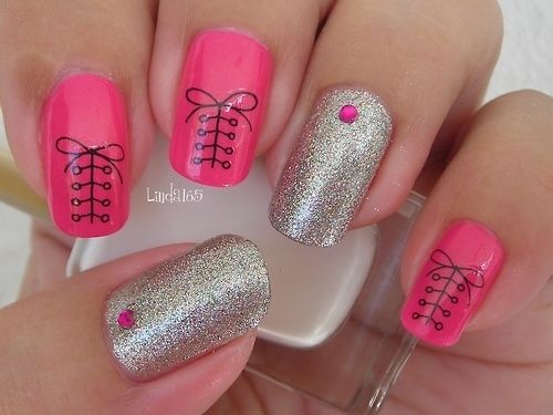 pink glitter bow stones nail design