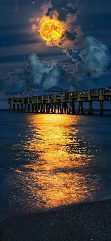 Amazing clouds and fiery moon