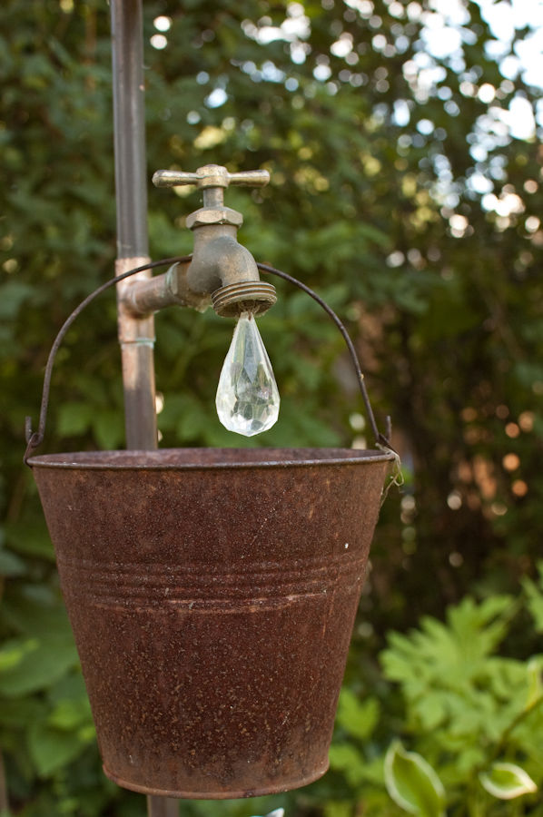 Old Faucet with Crystal Water Drop