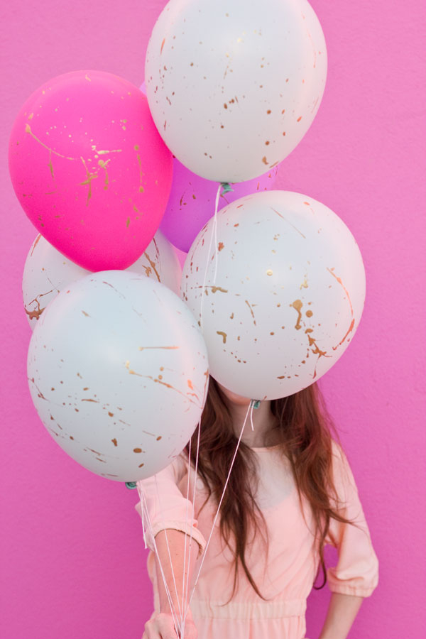Gold splatter balloons