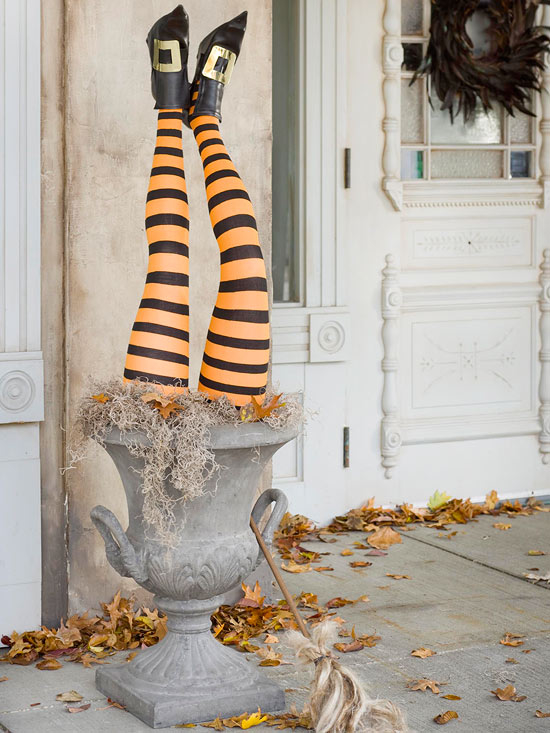 Upside down witch halloween urn
