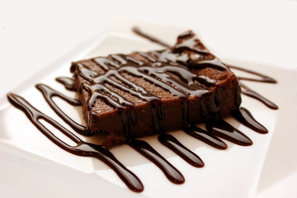 Chocolate Brownie With Chocolate Syrup Pictures, Photos, and Images for