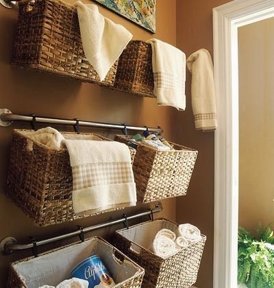 Hang baskets on curtain rods Hang baskets on curtain rods