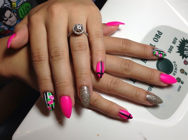 Cross and hot pink roses