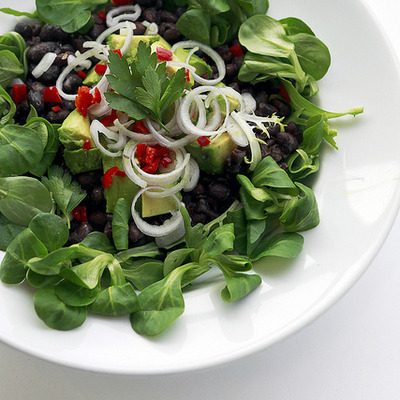 Black beans, mixed greens and chili peppers