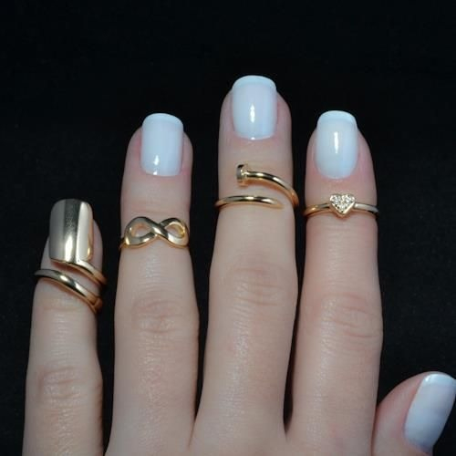 Powder white with gold plated nails