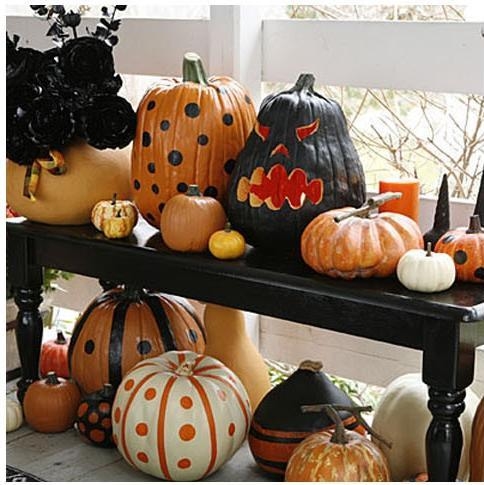 painted and carves pumpkins painted and carves pumpkins