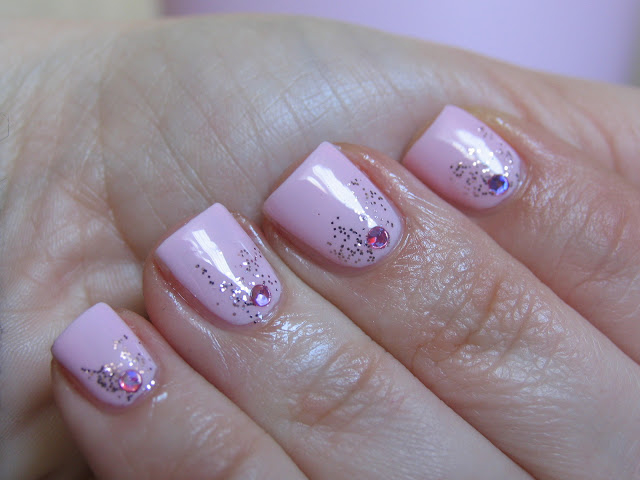 Pastel pink stud nails