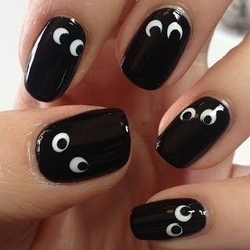 Spooky eyes nail art