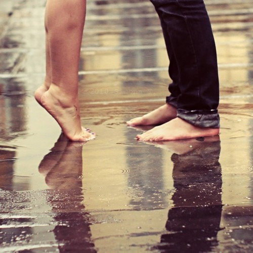Barefoot Couple In The Rain