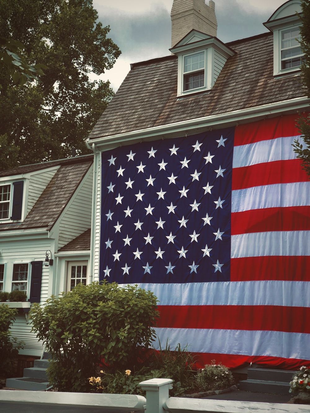 Large American Flag In Front Of House Pictures, Photos, and Images for