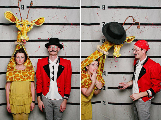 Circus master and giraffe