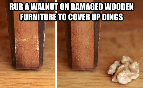 Rub a walnut on damaged wooden furniture Rub a walnut on damaged wooden furniture