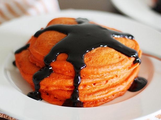 Pumpkin pancakes with black cinnamon syrup Pumpkin pancakes with black cinnamon syrup