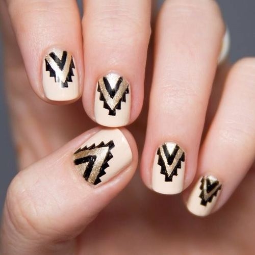 Gold and black aztec nails Gold and black aztec nails
