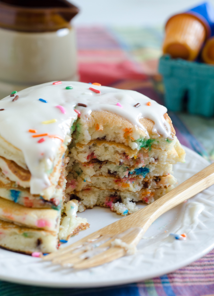 Vanilla icing pancakes with sprinkles Vanilla icing pancakes with sprinkles