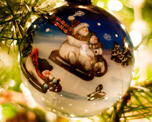 Snow man sled ornament