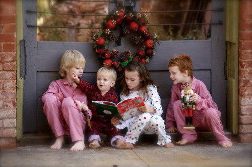Kids reading christmas book Kids reading christmas book