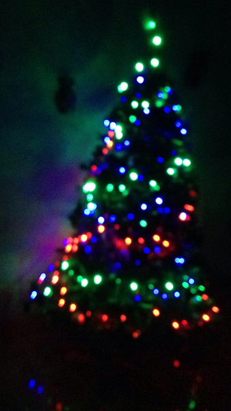 Decorated christmas tree in the dark