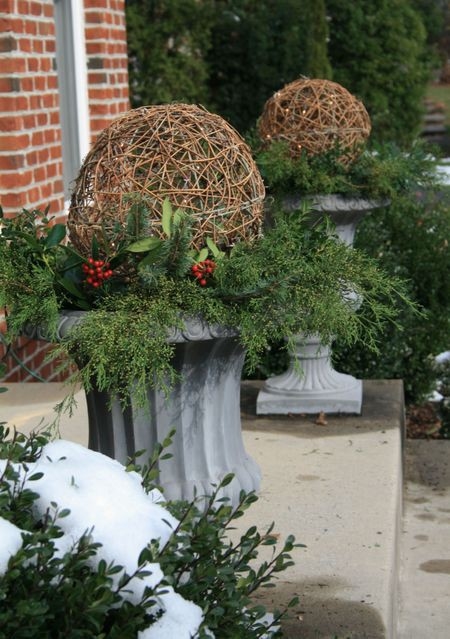 Wire ornaments with holly berry posts