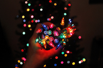 Hand full of colorful christmas lights Hand full of colorful christmas lights