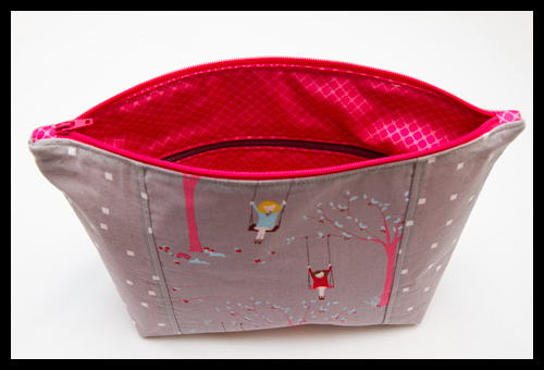 Pocketed cosmetic bag