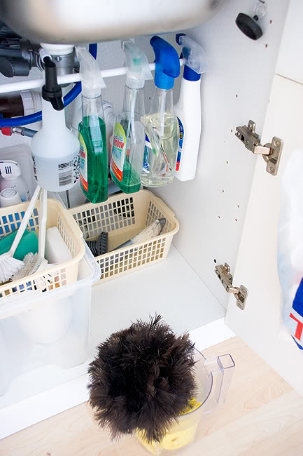 Tension rod to hang spray bottles
