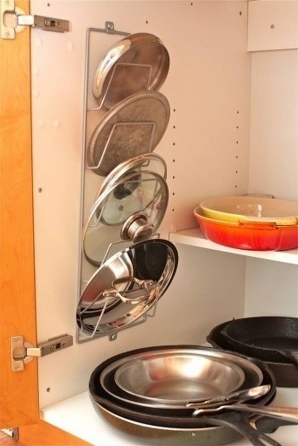 Organize pot lids with magazine rack Organize pot lids with magazine rack