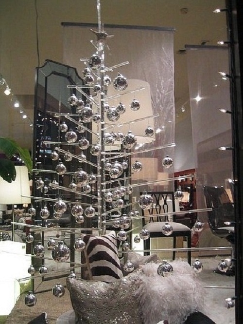Plastic christmas tree with silver ornaments