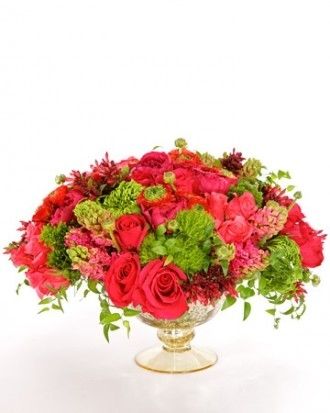 Rose carnation and orchid arrangement