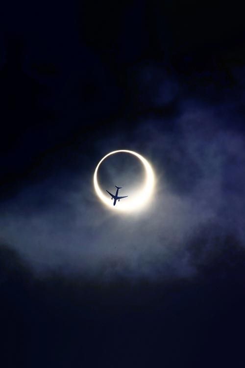 Plane over eclipse
