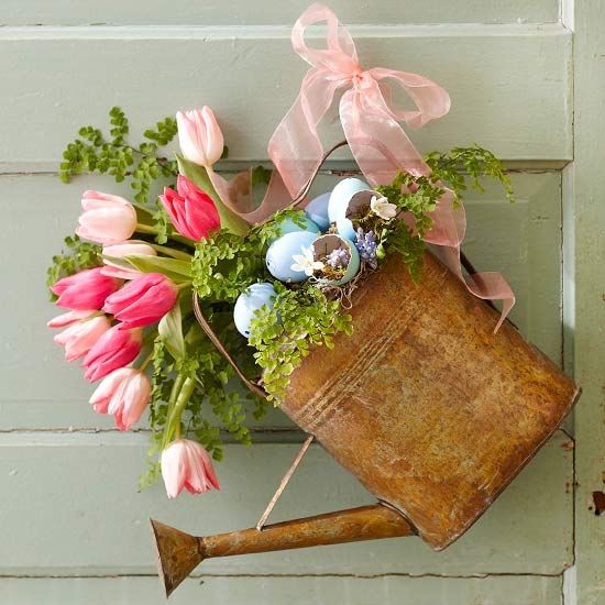 Spring watering can with flowers Spring watering can with flowers