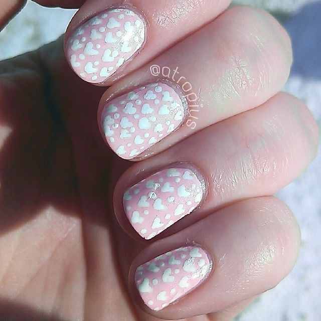 Pink and white hearted nails Pink and white hearted nails